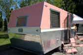 Great picture showing angular rearend of 1961 vintage Holiday House travel trailer