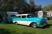 Photo of a 1956 chevy 210 2-door station wagon towing a 1961 shasta 16sc trailer