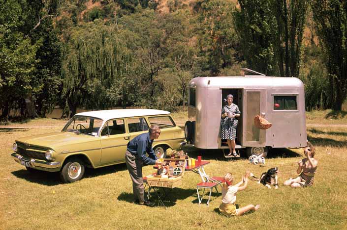 This vintage towing rig is a 1962 holden ej wagon pulling a vintage trailer