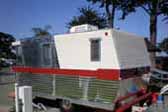 Side view picture of rare 1962 vintage Holiday House trailer