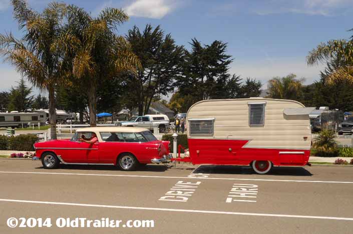 This vintage towing rig is a 1955 chevy nomad station wagon pulling a vintage 1964 shasta travel trailer