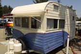 Sharp 1965 vintage Aljo Travel Trailer beach camping at Pismo Coast Village RV Park in California