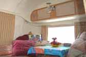 1968 Airstream Tradewind trailer with comfy and inviting dining room
