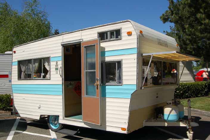 Image shows a very nicely restored Aladdin Vintage Travel Trailer