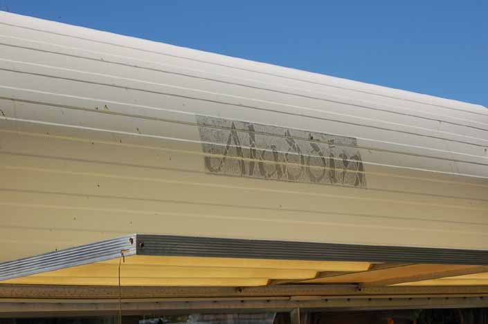 An original Aladdin logo decal sticker on an Aladdin Vintage Travel Trailer