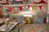 Beautiful decorations in sleeping area in 1969 Shasta Starflyte Trailer