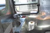 Practical Airstream Trailer-camper has a beautiful bathroom with all aluminum walls and counter-top
