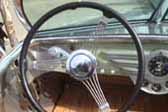 Classic banjo steering wheel in Decoliner Motor Home top level driver's seat