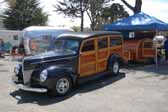 Picture of a 1940 ford woodie wagon towing a matching woodie teardrop trailer
