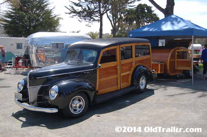 This vintage towing rig is a 1940 ford woodie station wagon pulling a woodie teardrop trailer