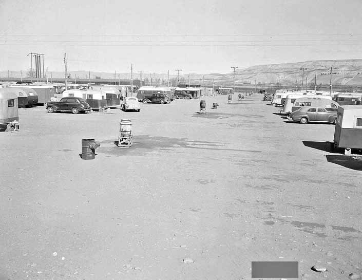Government photo shows a group of 1940's Travel Trailers that housed workers and their families, at Project Hanford Trailer City in Washington