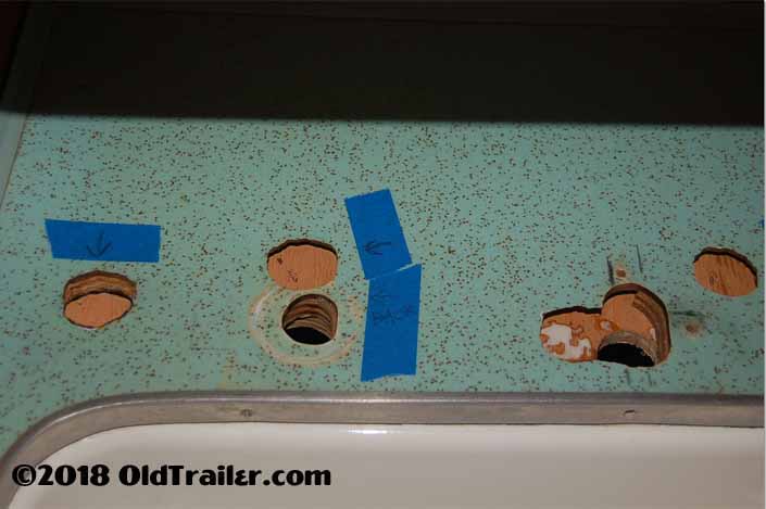 Before patching the holes in the formica countertop, attach a backing board on the underside of the countertop with screws and construction adhesive