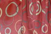 This photo shows a swatch of retro fabric with a colorful circles design, for your vintage trailer