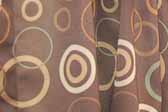 This image is a sample of a great looking retro fabric pattern with a 60's circles graphics design, for your vintage trailer