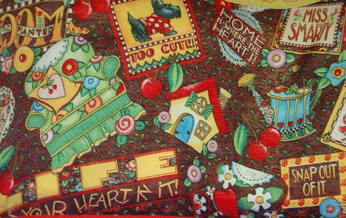 This photo shows a swatch of retro fabric with fun country designs, for your vintage trailer