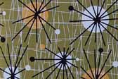 This image is a sample of a great looking retro fabric pattern with mid-century starbursts for your vintage trailer