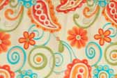This photo shows a swatch of retro fabric with a 1960's psychedelic paisley design, for your vintage trailer