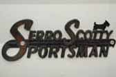 Serro Scotty Sportsman vintage trailer with an original Serro Scotty Sportsman cast logo emblem on the side