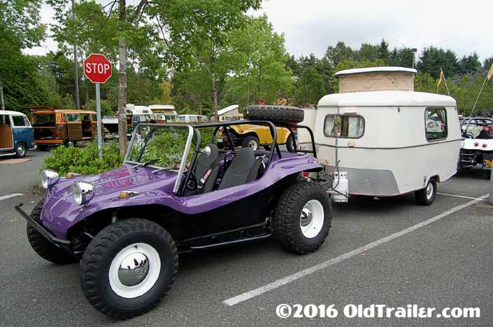 This vintage towing rig is a vintage vw meyers manx dune buggy pulling a vintage eriba puck trailer