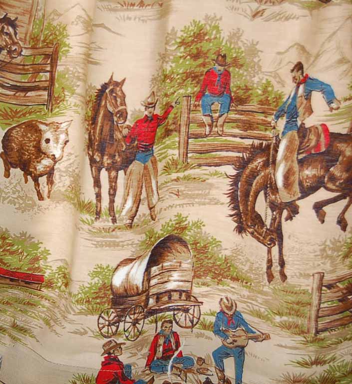 This photo shows a swatch of retro fabric with a classic 1950's cowboys, horses and chuck wagon pattern, for your vintage trailer