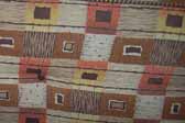 This photo shows a swatch of retro fabric from an original 1960's Shasta trailer cushion, for your vintage trailer