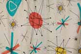 This image is a sample of a great looking retro fabric pattern with googies starbursts designs, for your vintage trailer