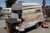 Original fiberglass 1954 Kompak trailer uses styling and tail lights from a 1954 Ford