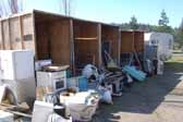 Large collection of original appliances and fixtures salvaged from vintage trailers and now stored in a vintage trailer junk yard