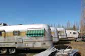 Nice collection of vintage Silver Streak trailers found in a vintage trailer storage yard