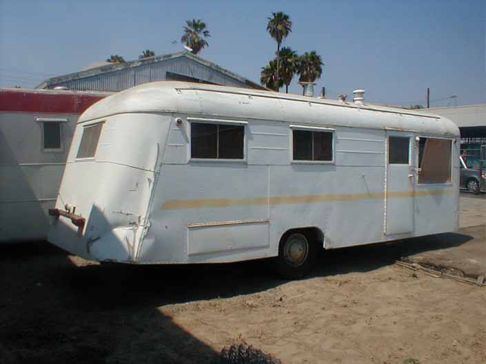 Vintage trailer salvage yard has a 1948 Westcraft Westwood vintage trailer